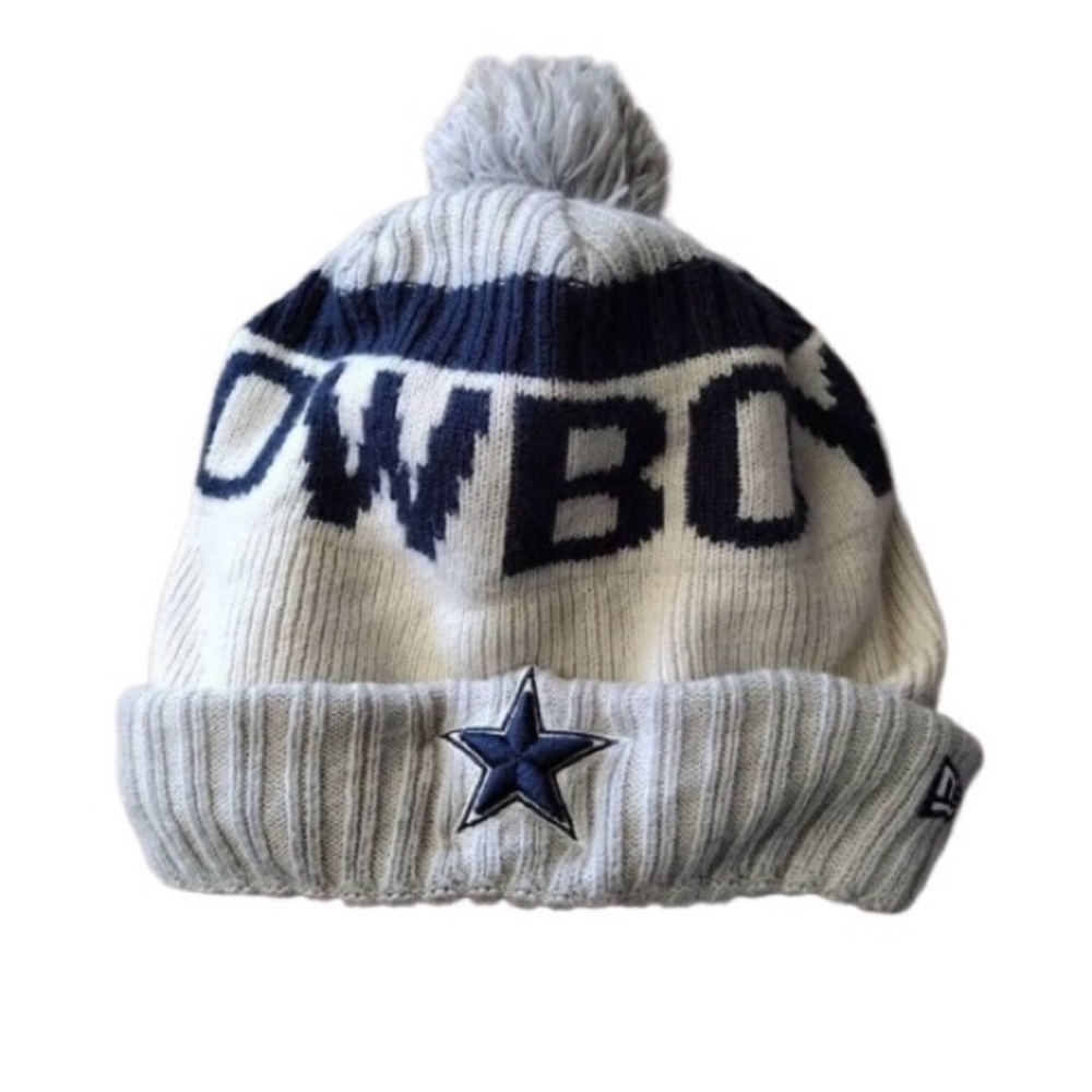 Cowboys knit beanie with a pom and team logo